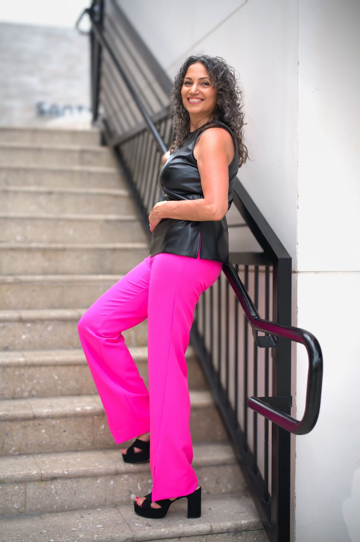 Alaina Schwartz standing on a flight of outdoor stairs